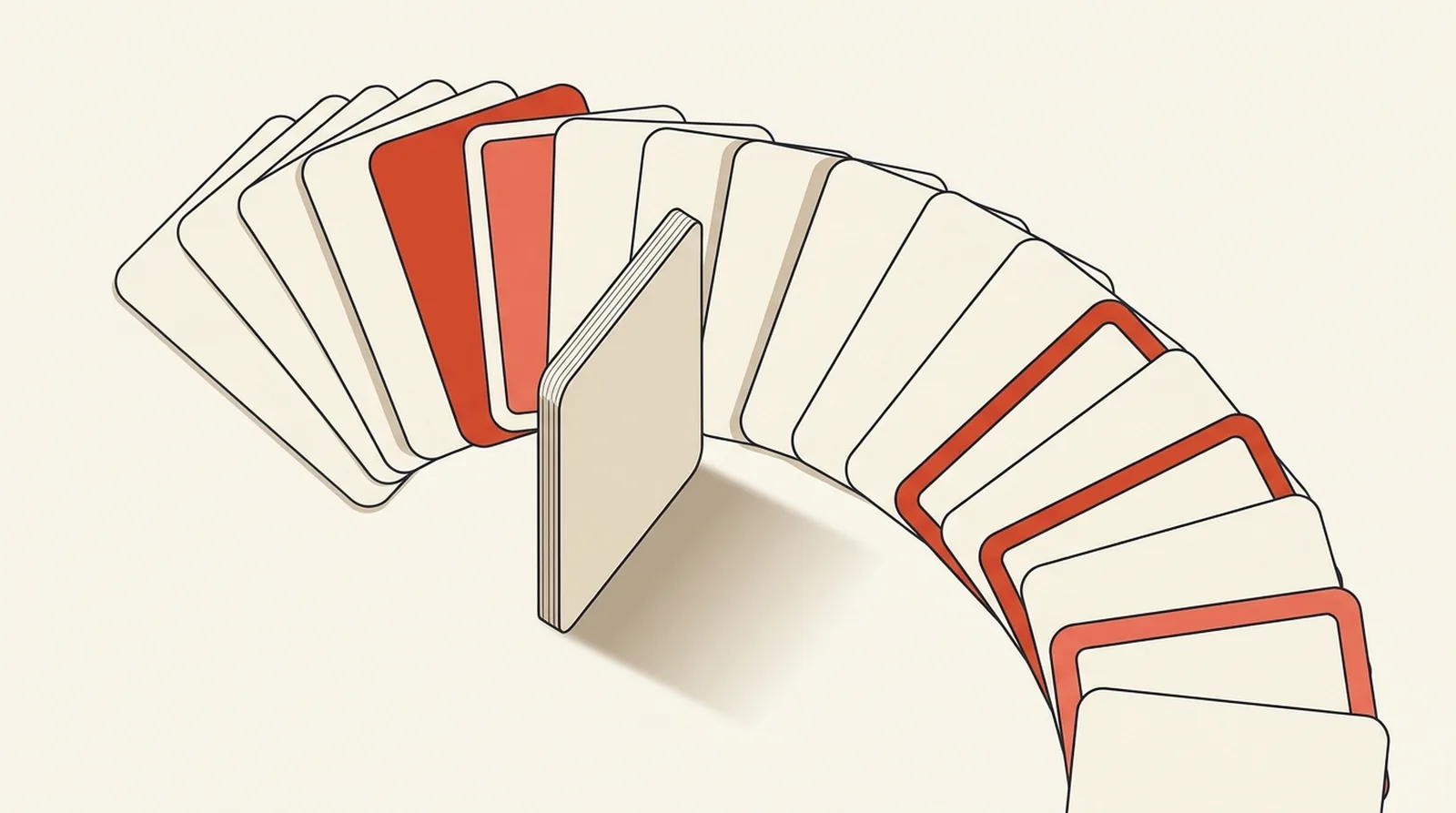 A fanned arc of cards with one caught mid-flip